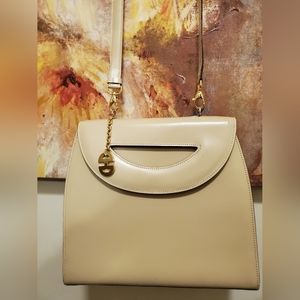 Celine Paris elegant leather bag with long strap and Celine charm